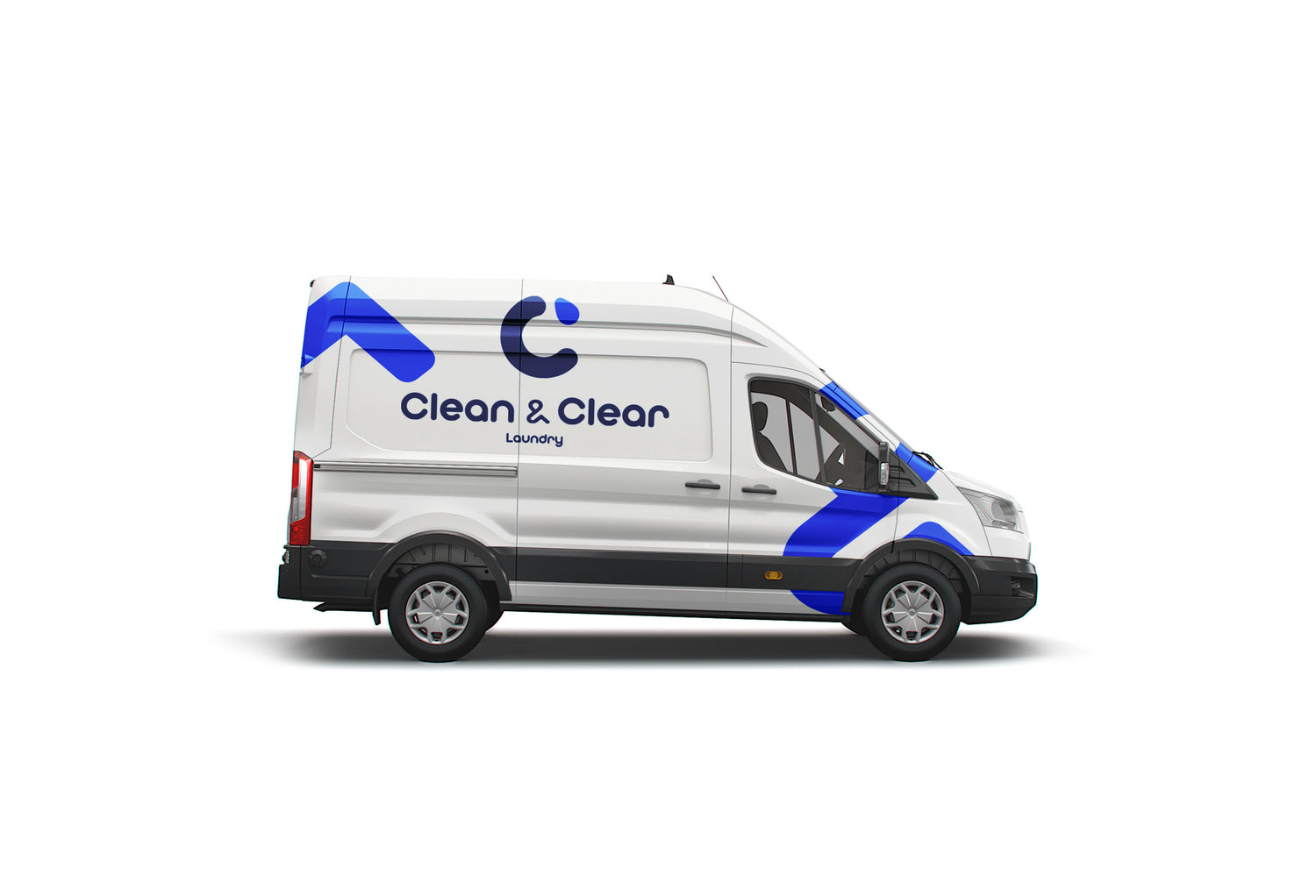 White_van_with_blue_accents_and_Clean_Clear_Laundry_branding_on_a_white_background